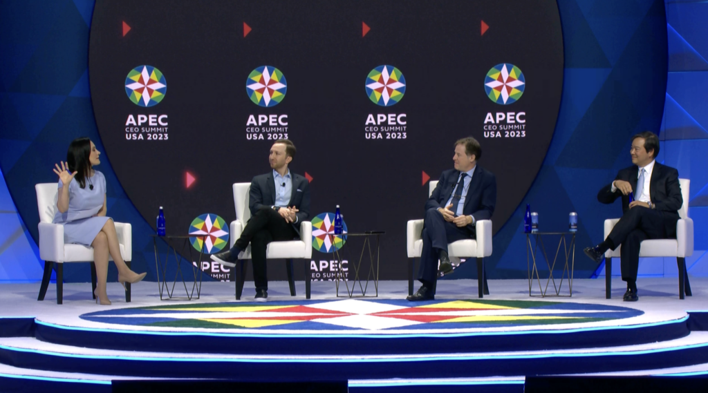 Aaron Tartakovsky on stage during APEC with fellow panelists Manny Maceda and Nick Clegg.
